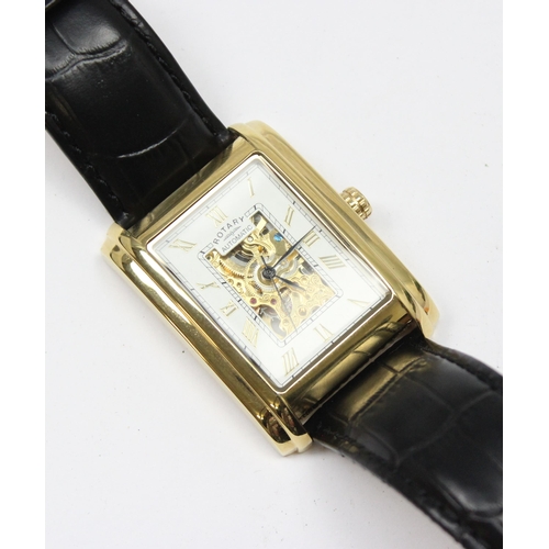 1318 - A vintage Rotary skeleton watch with automatic movement, gold plated case and black leather strap, m... 