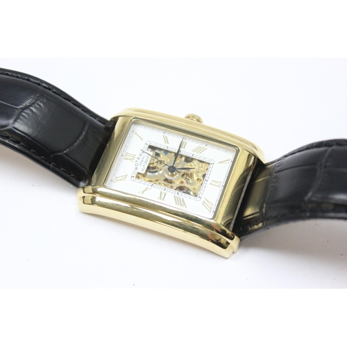 1318 - A vintage Rotary skeleton watch with automatic movement, gold plated case and black leather strap, m... 