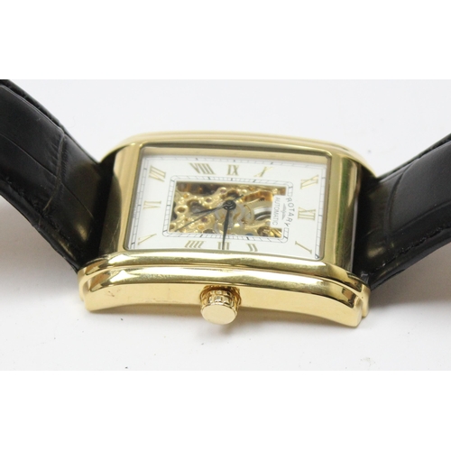 1318 - A vintage Rotary skeleton watch with automatic movement, gold plated case and black leather strap, m... 