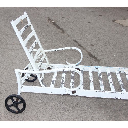 306 - A vintage white painted aluminium garden lounger, approx 168cm wide x 75cm deep x 110cm tall