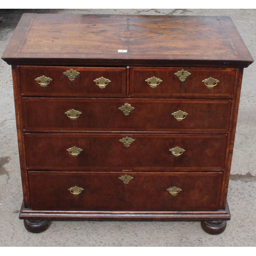 1 - A late 17th or early 18th century 2 over 3 chest of drawers with bun feet and later Georgian brass h... 