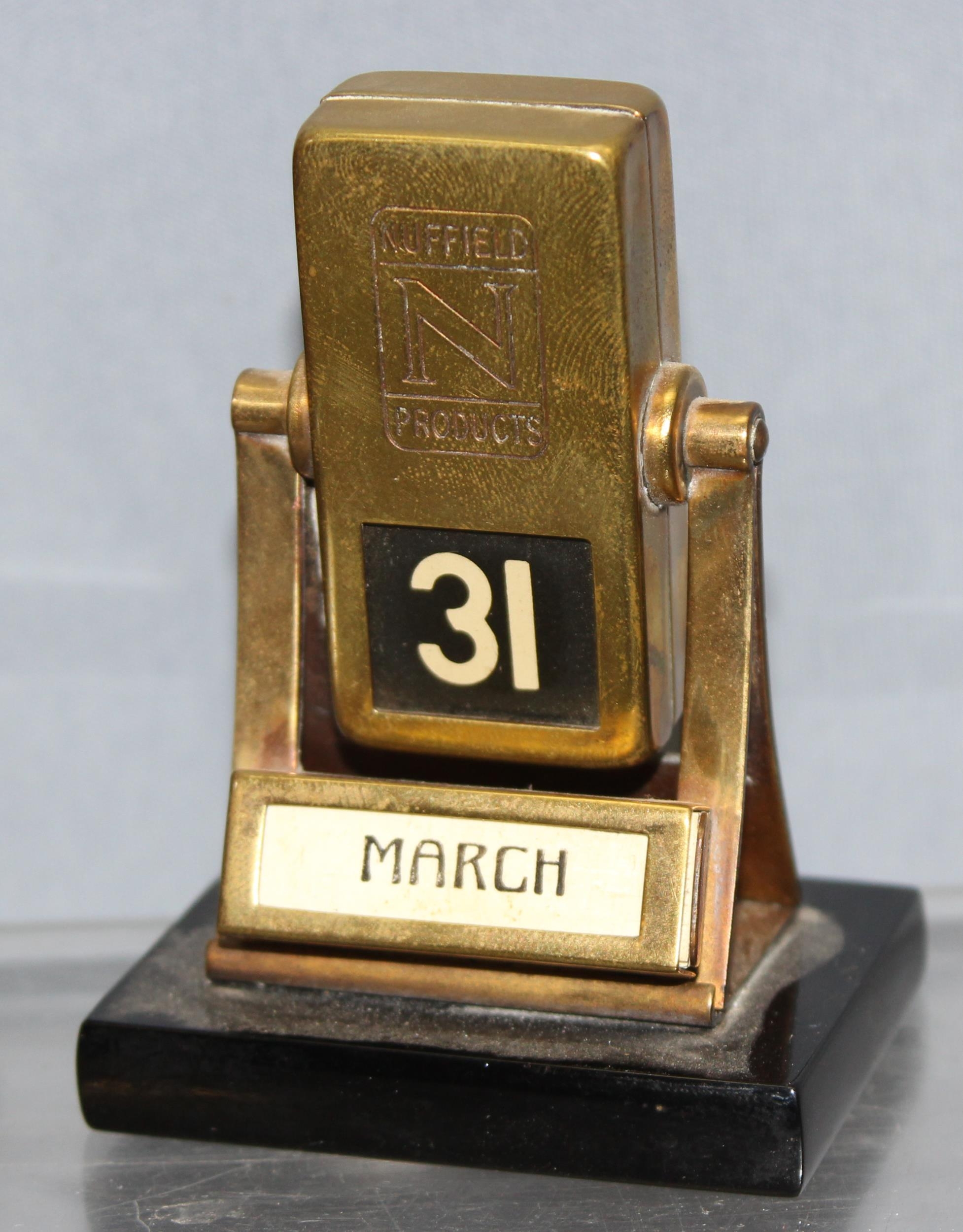 Antique perpetual desk calendar in oak glazed case and a smaller brass