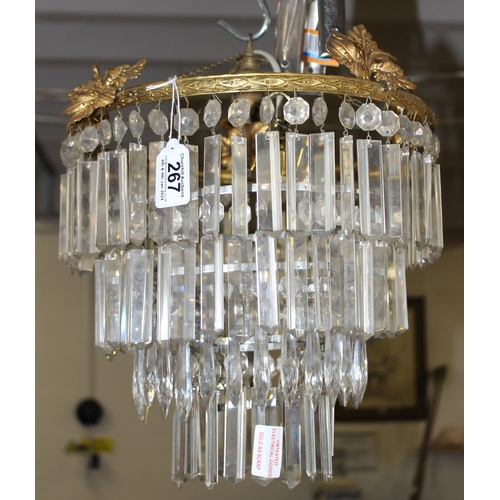 267 - A vintage crystal drop chandelier with brass mounts, approx 32cm in diameter