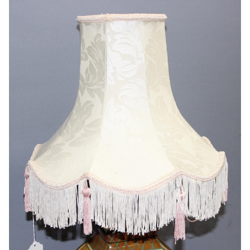 234 - Ceramic hand painted lamp decorated with floral design on footed base with shade, approx 74cm incl s... 