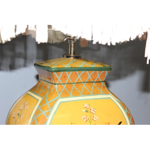 234 - Ceramic hand painted lamp decorated with floral design on footed base with shade, approx 74cm incl s... 