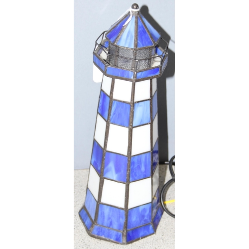 235 - Tiffany style lighthouse lamp in blue and white leaded glass, approx 29cm