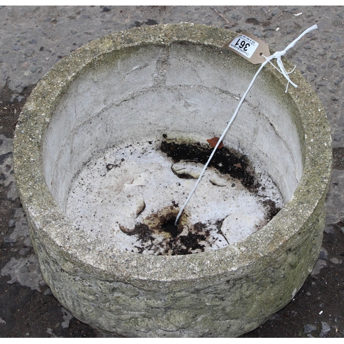 361 - A textured concrete planter, approx 43cm wide x 43cm deep x 23cm tall