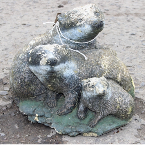 362 - A painted concrete badger garden statue, approx 31cm wide x 31cm deep x 31cm tall