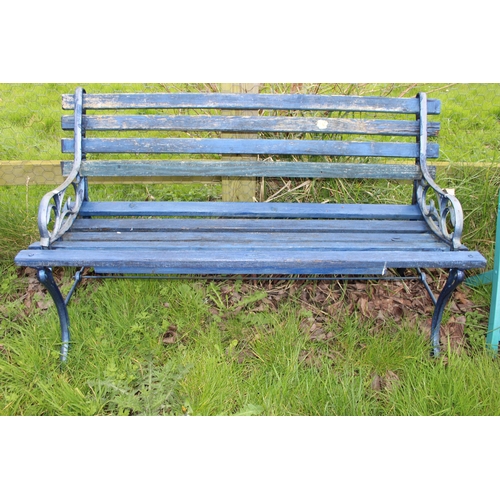 364 - A blue painted wooden garden bench with cast iron ends, approx 120cm wide x 47cm deep x 67cm tall