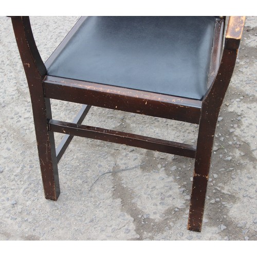 17 - A vintage oak and studded faux leather desk chair, approx 51cm wide x 51cm deep x 73cm tall