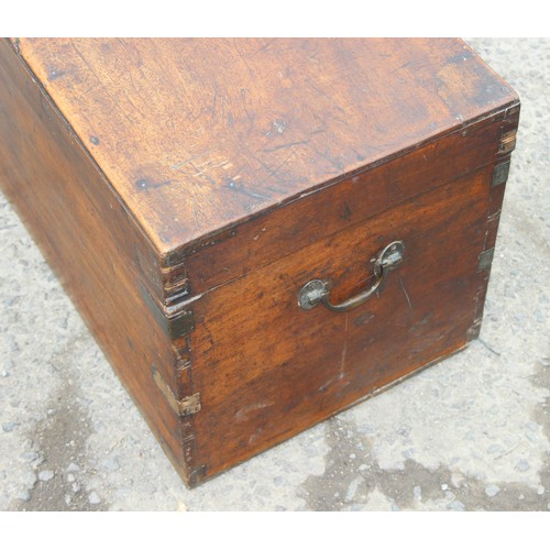 19 - A 19th century mahogany trunk with brass bound corners, approx 89cm wide x 40cm deep x 41cm tall