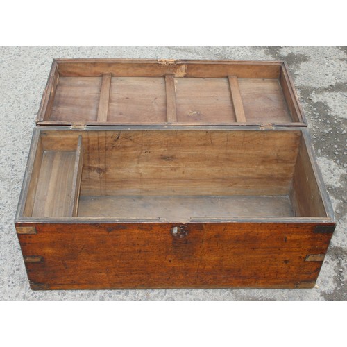 19 - A 19th century mahogany trunk with brass bound corners, approx 89cm wide x 40cm deep x 41cm tall