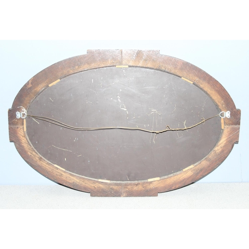 408 - An Art Deco period oval oak framed mirror, approx 82cm x 53cm