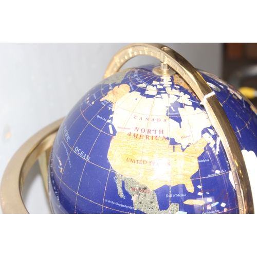 659 - A large vintage table top gemstone globe on gold plated stand, approx 40cm tall x 20cm in diameter