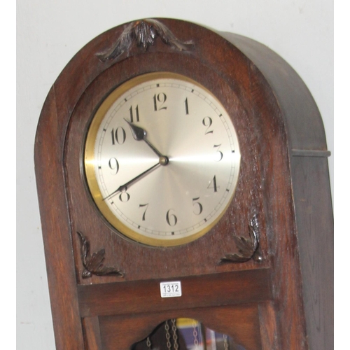 1312 - A large early 20th century grandfather clock with oak dome topped case, silvered dial and mechanical... 