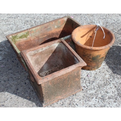 320 - 3 terracotta garden pots, largest approx 50cm wide x 24cm deep x 18cm tall