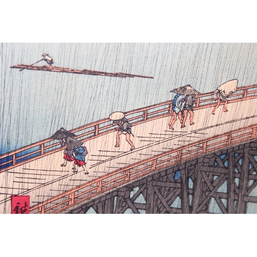 402 - After Utagawa Hiroshige (1797-1858), a Japanese woodblock print Sudden Shower over Shin-Ōhashi bridg... 