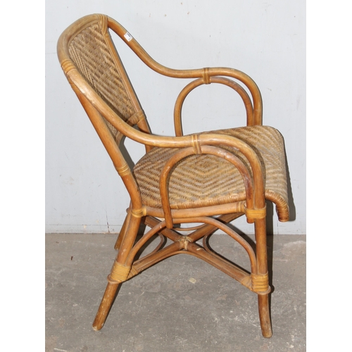 84 - A pair of retro bamboo and wicker armchairs