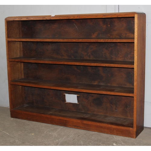 92 - A large vintage oak bookcase, approx 152cm wide x 26cm deep x 119cm tall