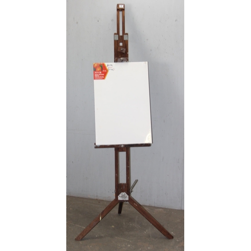 95 - A large wooden floor standing artist's easel and canvas, as photographed approx 212cm tall