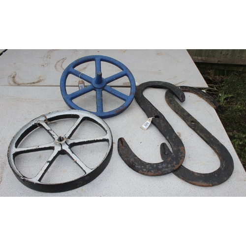 325 - A pair of vintage painted cast iron barrow or cart wheels, each approx 47cm wide x 47cm deep and a p... 