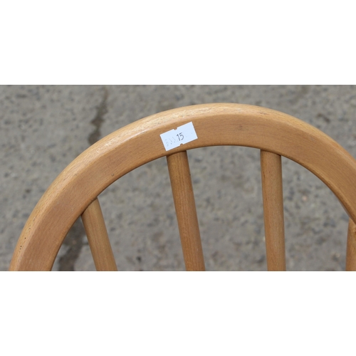 1 - A set of 5 blonde Ercol Quaker 365 high hoop back dining chairs, some bearing blue & gold labels, ea... 