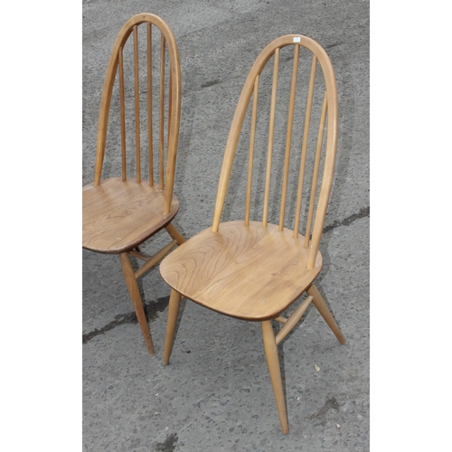 1 - A set of 5 blonde Ercol Quaker 365 high hoop back dining chairs, some bearing blue & gold labels, ea... 