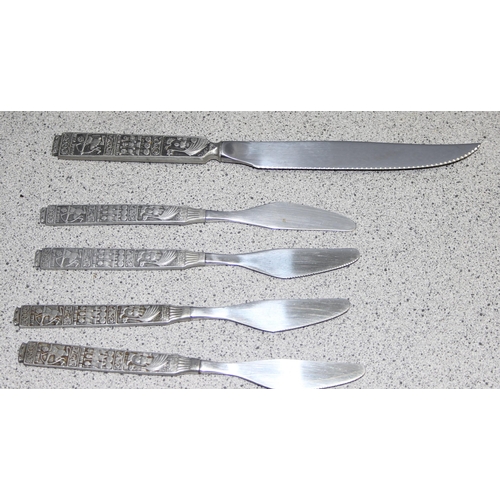 1007 - An extensive retro Norwegian cutlery set by HS Konge made from tin, pewter & stainless steel, the ha... 