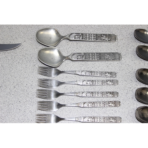 1007 - An extensive retro Norwegian cutlery set by HS Konge made from tin, pewter & stainless steel, the ha... 