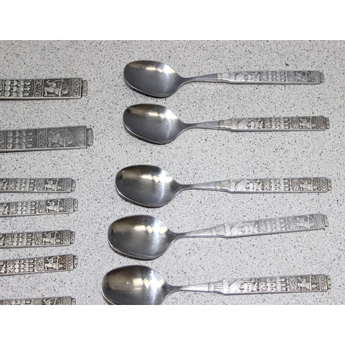 1007 - An extensive retro Norwegian cutlery set by HS Konge made from tin, pewter & stainless steel, the ha... 