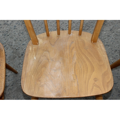 2 - A set of 4 blonde Ercol Windsor 370 dining chairs, each approx 86cm tall