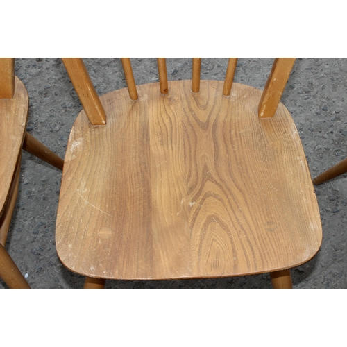 2 - A set of 4 blonde Ercol Windsor 370 dining chairs, each approx 86cm tall