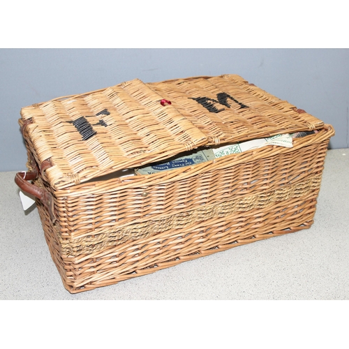 200 - Wicker picnic basket with blanket and other items