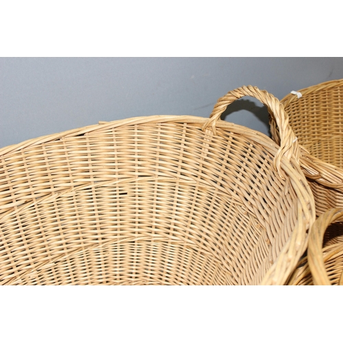 270 - 3 wicker baskets to incl 2 laundry baskets and a shopping basket, largest approx 65cm wide