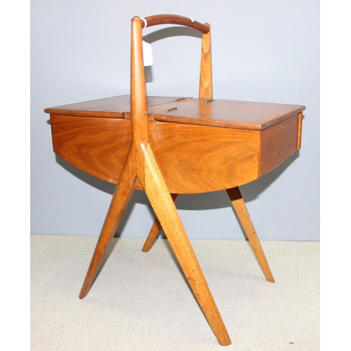 271 - Retro wooden Danish style sewing box on legs, approx 51 x 30 x 64cm, and two Oxo tins of buttons