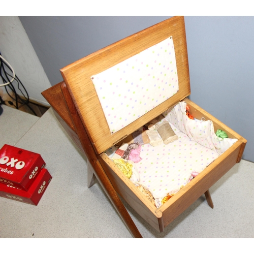 271 - Retro wooden Danish style sewing box on legs, approx 51 x 30 x 64cm, and two Oxo tins of buttons