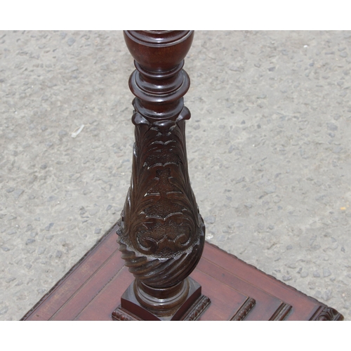 29 - A large vintage carved mahogany torchiere or candle stand, approx 138cm tall