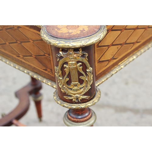 3 - A 19th century French marquetry inlaid kingwood Jardinière table with gilt metal gallery and mountin... 