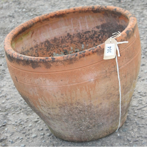 304 - A large vintage terracotta planter pot, approx 46cm wide x 46cm deep x 36cm tall