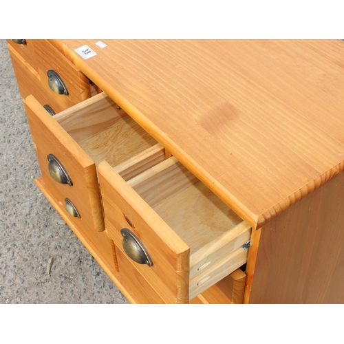 33 - An unusual contemporary pine 10 drawer chest of drawers, approx 91cm wide x 39cm deep x 80cm tall