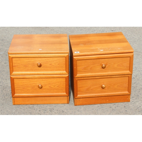 38 - A pair of mid century teak G-Plan 2 drawer bedside cabinets or end tables, approx 50cm wide x 46cm d... 