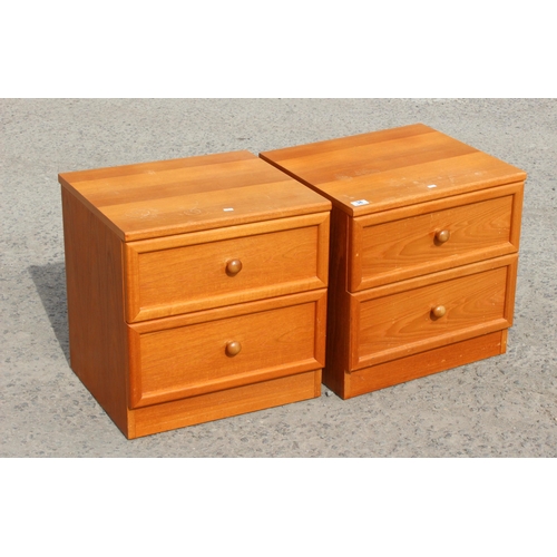 38 - A pair of mid century teak G-Plan 2 drawer bedside cabinets or end tables, approx 50cm wide x 46cm d... 