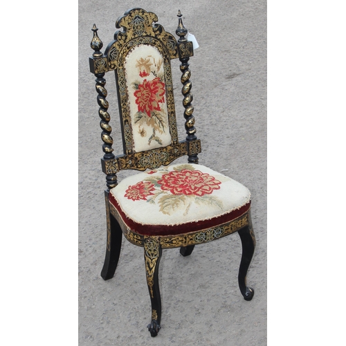 4 - A 19th century highly decorative ebonised and gilt decorated chair with barleytwist supports and flo... 