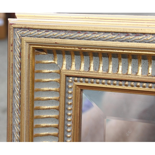 417 - An extremely large gilt framed wall mirror, approx 195cm x 135cm