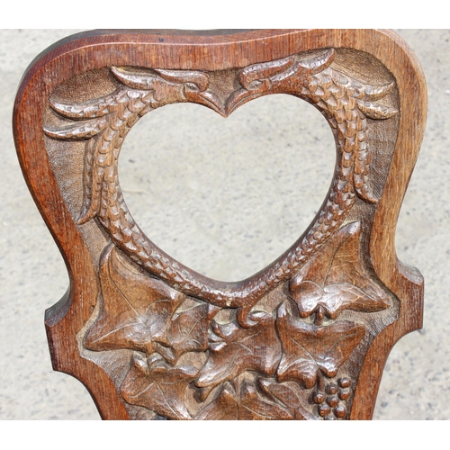 47 - 2 pieces of carved oak furniture to inc a hall or spinning chair and a 3 legged side table, table ap... 