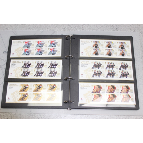 500 - A full set of 29 London 2012 gold medal winner stamps, 174 unused first class stamps, and 34 pairs o... 