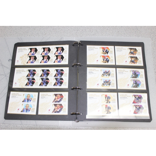 500 - A full set of 29 London 2012 gold medal winner stamps, 174 unused first class stamps, and 34 pairs o... 