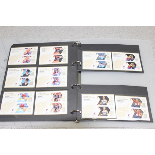 500 - A full set of 29 London 2012 gold medal winner stamps, 174 unused first class stamps, and 34 pairs o... 