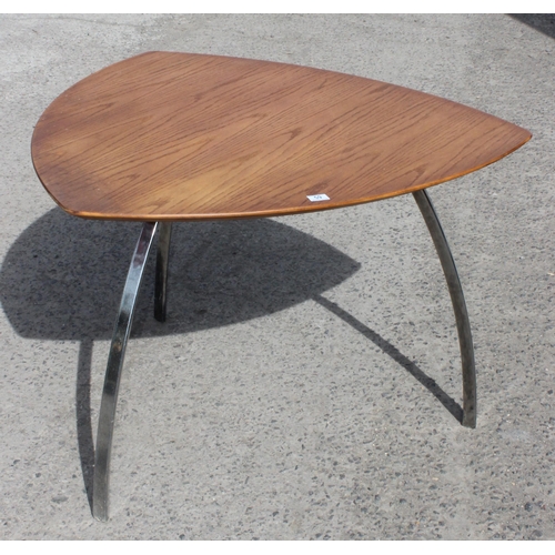 59 - In the manner of Marc Berthier, a retro Tucano style dining table with wooden top and chrome legs, a... 