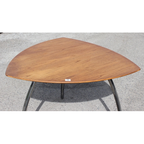 59 - In the manner of Marc Berthier, a retro Tucano style dining table with wooden top and chrome legs, a... 